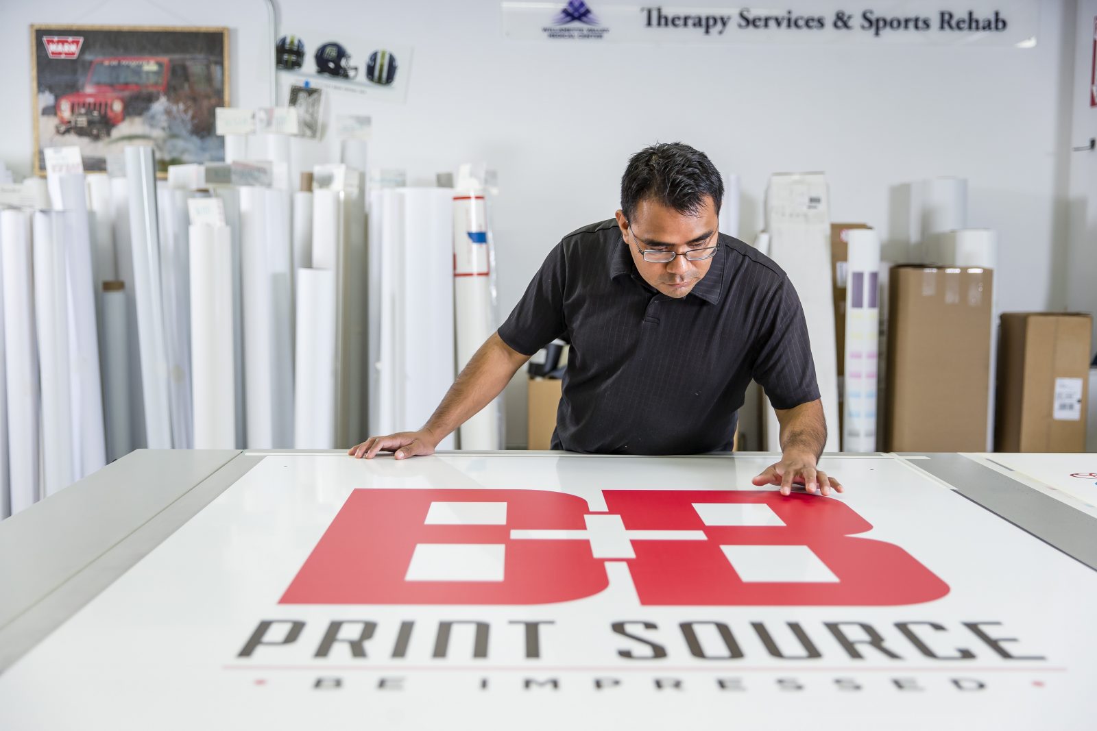 B & B Print Source printed logo on table